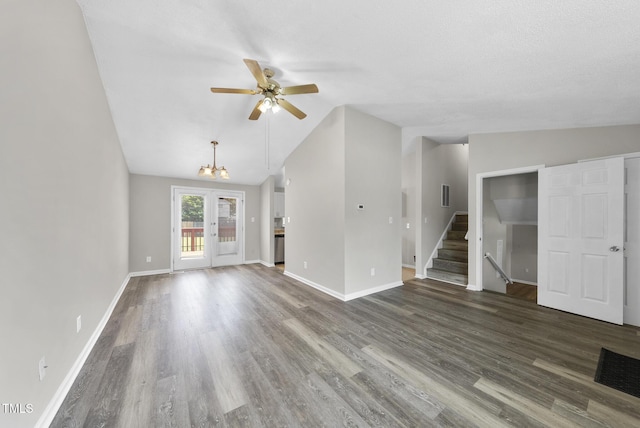 5529 Wood Pond Ct, Raleigh, NC 27610 - unfurnished living room with vaulted ceiling, wood finished floors, a ceiling fan, stairs, and baseboards