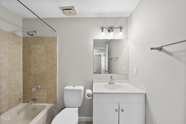 5529 Wood Pond Ct, Raleigh, NC 27610 - full bath featuring vanity, toilet, shower / washtub combination, and a textured ceiling