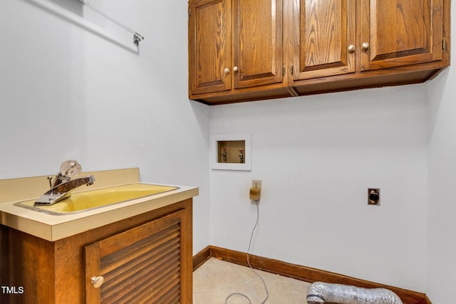 1164 Keith Hills Rd, Lillington, NC 27546 - laundry area with hookup for an electric dryer, washer hookup, cabinet space, baseboards, and tile patterned flooring