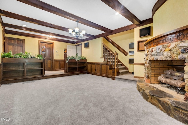 1164 Keith Hills Rd, Lillington, NC 27546 - living area with stairway, carpet flooring, beam ceiling, a chandelier, and wainscoting