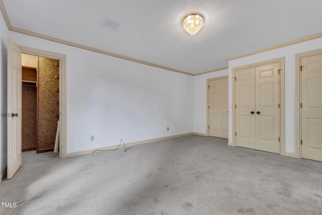 1164 Keith Hills Rd, Lillington, NC 27546 - unfurnished bedroom with carpet floors, crown molding, and baseboards