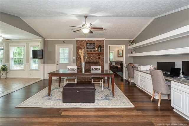 5621 Monks Walk Ct, Fayetteville, NC 28311 - office with a textured ceiling, a ceiling fan, vaulted ceiling, crown molding, and dark wood finished floors