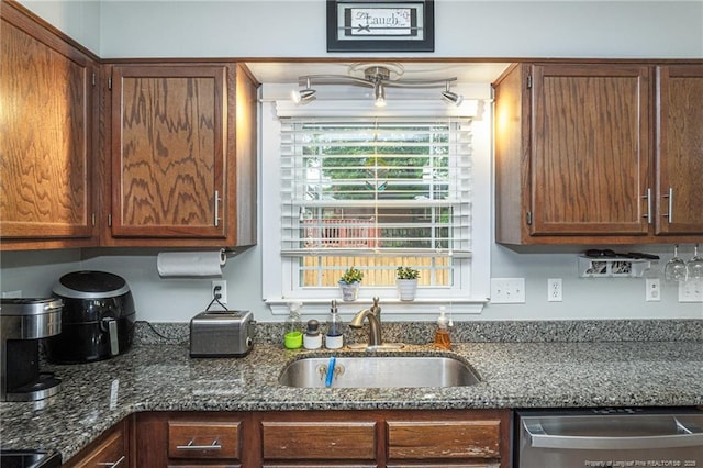 5621 Monks Walk Ct, Fayetteville, NC 28311 - kitchen featuring dishwasher, a sink, and dark stone counters