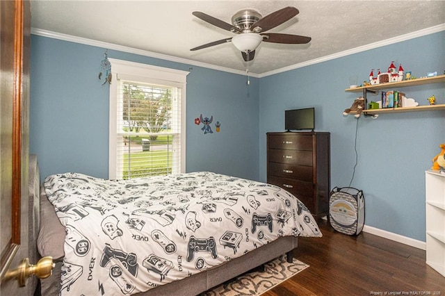5621 Monks Walk Ct, Fayetteville, NC 28311 - bedroom featuring dark wood finished floors, baseboards, ornamental molding, and ceiling fan