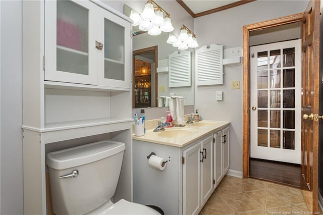 5621 Monks Walk Ct, Fayetteville, NC 28311 - bathroom featuring vanity, toilet, tile patterned flooring, and crown molding