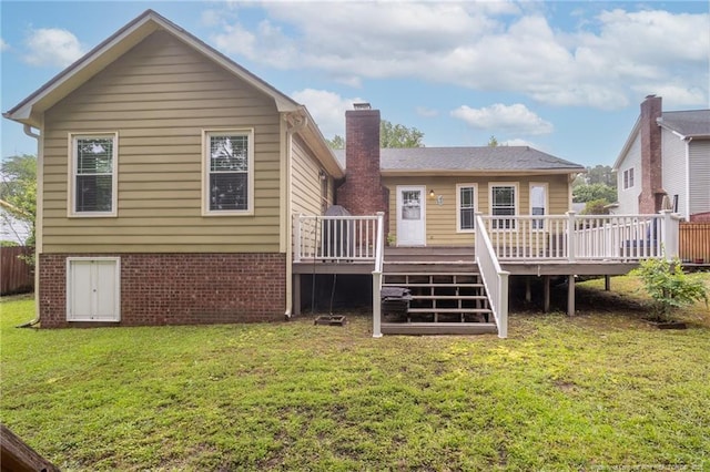5621 Monks Walk Ct, Fayetteville, NC 28311 - back of property with a chimney, a wooden deck, a yard, and brick siding