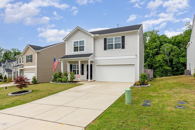 150 Sherrill Place Ln, Garner, NC 27529 - traditional-style house with a garage, driveway, a front lawn, and board and batten siding