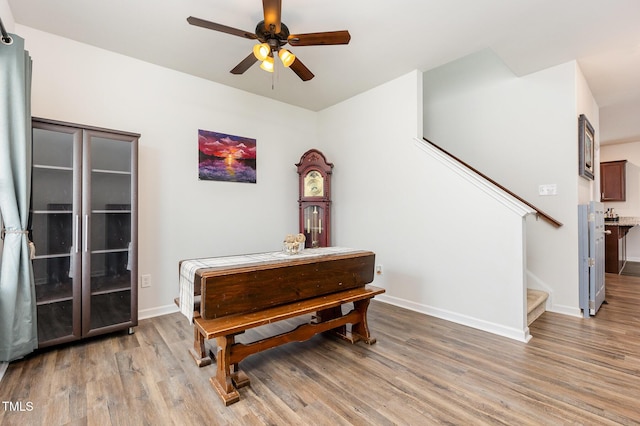 150 Sherrill Place Ln, Garner, NC 27529 - living area featuring stairs, a ceiling fan, and light wood-type flooring