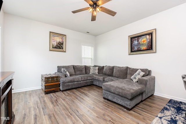150 Sherrill Place Ln, Garner, NC 27529 - living area featuring a ceiling fan and wood finished floors