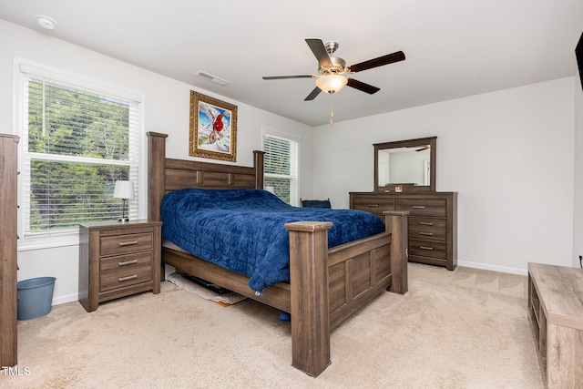 150 Sherrill Place Ln, Garner, NC 27529 - bedroom with light carpet, multiple windows, and ceiling fan