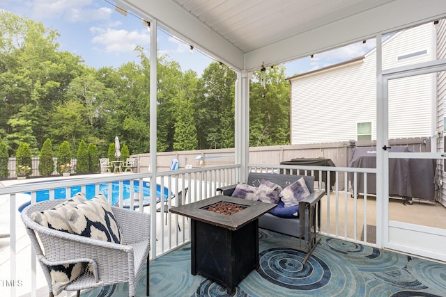 150 Sherrill Place Ln, Garner, NC 27529 - wooden deck featuring an outdoor fire pit, a fenced backyard, and a patio area