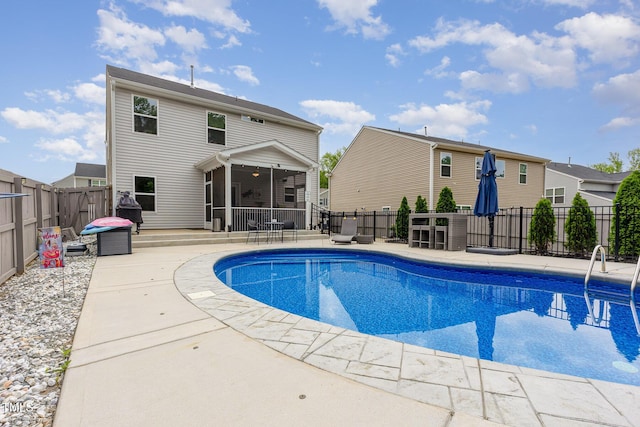 150 Sherrill Place Ln, Garner, NC 27529 - view of pool with a sunroom, a patio area, and a fenced backyard