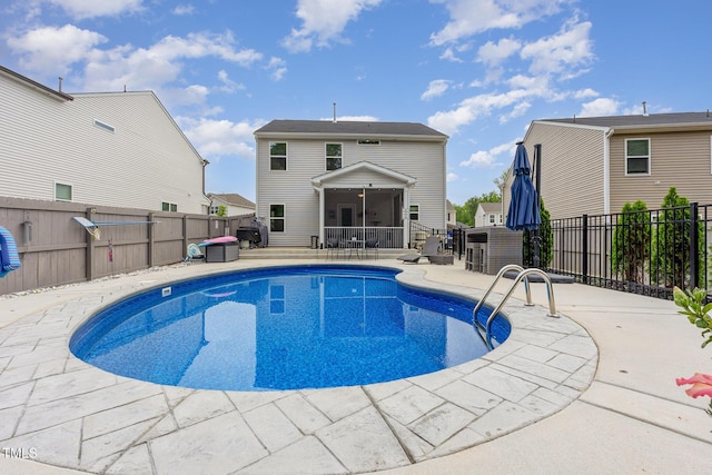 150 Sherrill Place Ln, Garner, NC 27529 - view of pool featuring a sunroom, a fenced backyard, and a patio