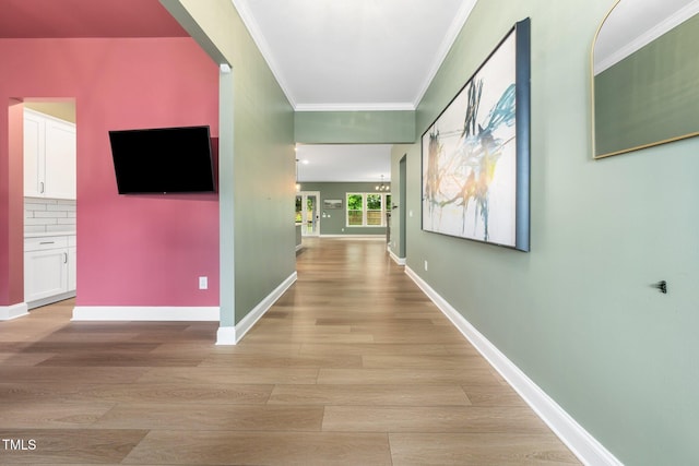 20 Scotland Dr, Youngsville, NC 27596 - hall with crown molding, light wood finished floors, and baseboards