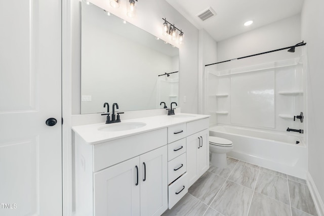 20 Scotland Dr, Youngsville, NC 27596 - bathroom with double vanity, shower / washtub combination, toilet, and recessed lighting