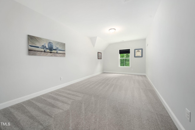 20 Scotland Dr, Youngsville, NC 27596 - carpeted empty room with baseboards and lofted ceiling