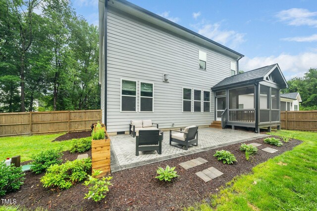 20 Scotland Dr, Youngsville, NC 27596 - rear view of property with a sunroom, a patio, and an outdoor hangout area