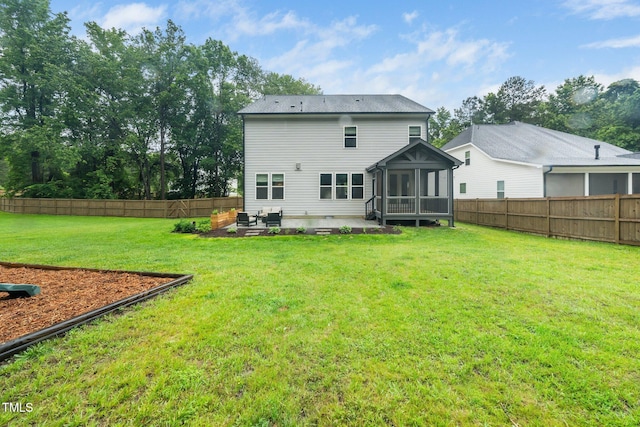 20 Scotland Dr, Youngsville, NC 27596 - back of property featuring a patio and a sunroom