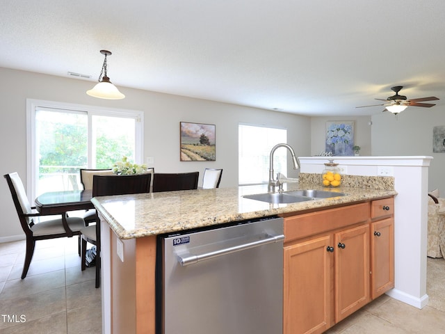 3515 Mountain Brook Cir, Durham, NC 27704 - kitchen with stainless steel dishwasher, a sink, light tile patterned floors, and plenty of natural light