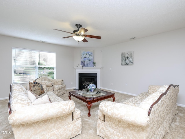 3515 Mountain Brook Cir, Durham, NC 27704 - living area with light carpet, ceiling fan, and baseboards