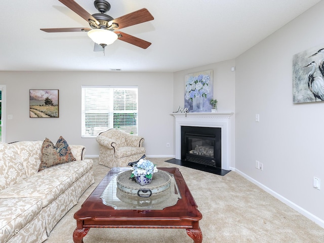 3515 Mountain Brook Cir, Durham, NC 27704 - living area featuring carpet floors, a fireplace with flush hearth, baseboards, and a ceiling fan