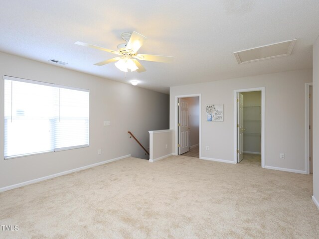 3515 Mountain Brook Cir, Durham, NC 27704 - unfurnished room featuring light colored carpet, ceiling fan, and baseboards