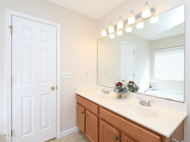 3515 Mountain Brook Cir, Durham, NC 27704 - full bath with double vanity and baseboards