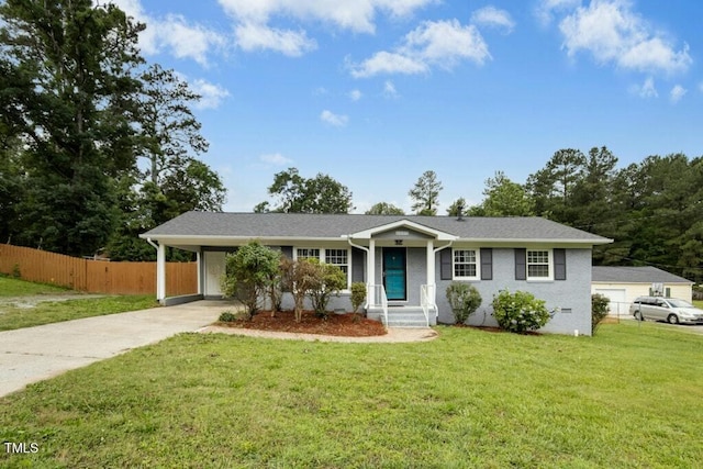 4021 Chaucer Dr, Durham, NC 27705 - ranch-style house with concrete driveway and an attached carport