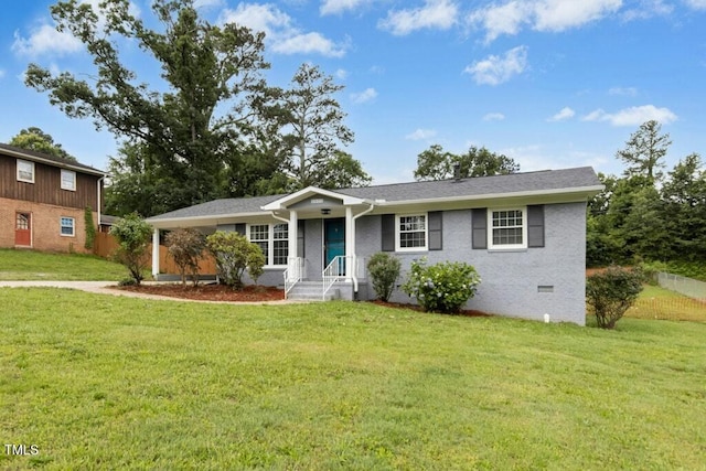 4021 Chaucer Dr, Durham, NC 27705 - view of front of property with crawl space, a front yard, and brick siding