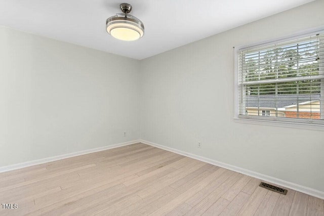 4021 Chaucer Dr, Durham, NC 27705 - empty room featuring light wood-style floors and baseboards