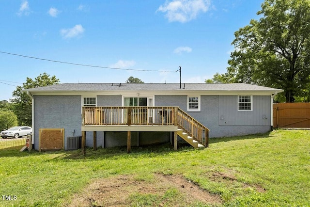 4021 Chaucer Dr, Durham, NC 27705 - rear view of property featuring a wooden deck, stairway, and central air condition unit