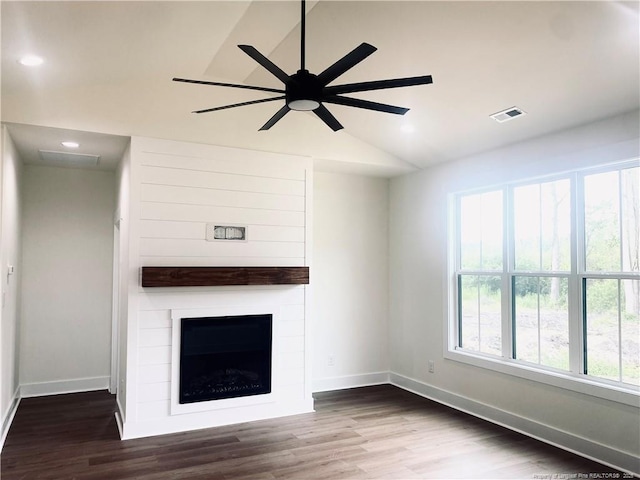 285 Delmore Rd, Autryville, NC 28318 - unfurnished living room featuring baseboards, vaulted ceiling, dark wood finished floors, ceiling fan, and recessed lighting