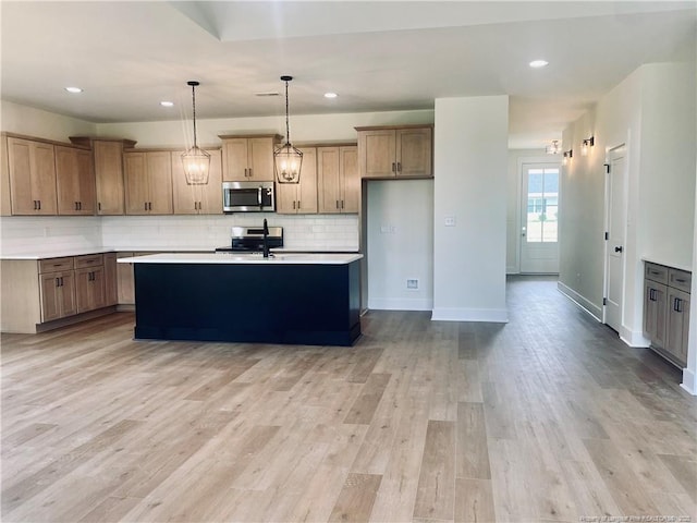 285 Delmore Rd, Autryville, NC 28318 - kitchen with appliances with stainless steel finishes, tasteful backsplash, light countertops, recessed lighting, and baseboards