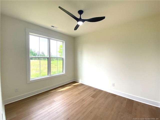 285 Delmore Rd, Autryville, NC 28318 - spare room featuring baseboards, ceiling fan, and wood finished floors