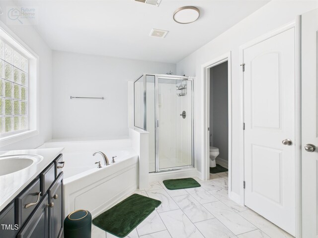 1728 Callandale Ave, Cary, NC 27518 - full bathroom with a garden tub, a shower stall, toilet, marble finish floors, and vanity