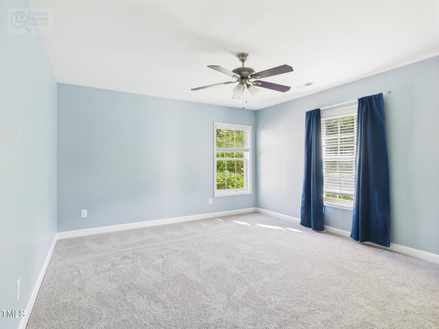 1728 Callandale Ave, Cary, NC 27518 - unfurnished room with baseboards, carpet, healthy amount of natural light, and a ceiling fan