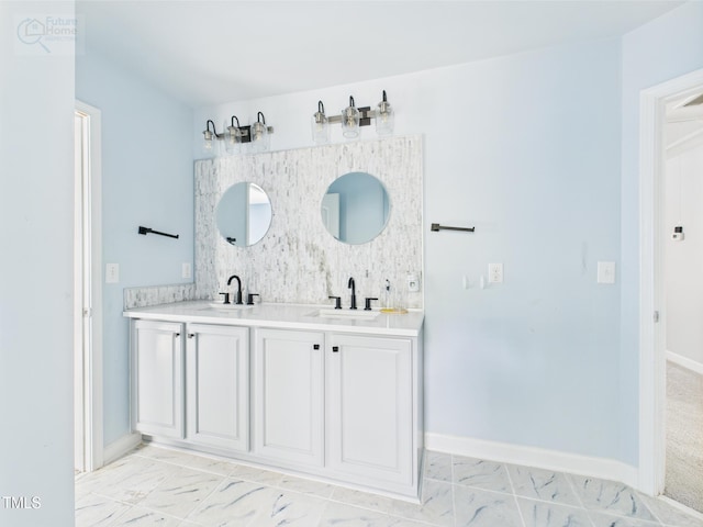 1728 Callandale Ave, Cary, NC 27518 - bathroom with double vanity, decorative backsplash, marble look tiles, and baseboards