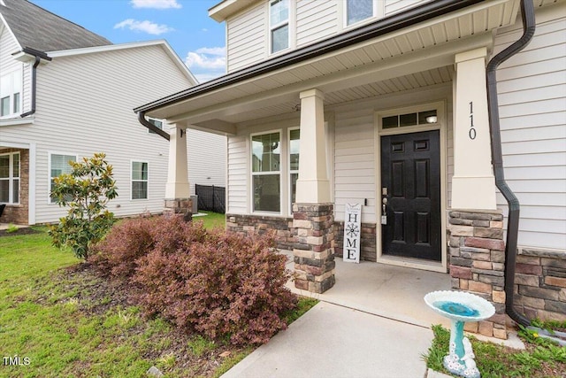 110 Gallery Park Dr, Franklinton, NC 27525 - entrance to property featuring covered porch and stone siding