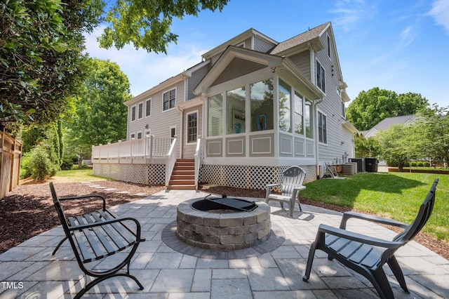 100 Maywood Way, Chapel Hill, NC 27516 - view of patio / terrace with an outdoor fire pit, a sunroom, stairway, a wooden deck, and cooling unit