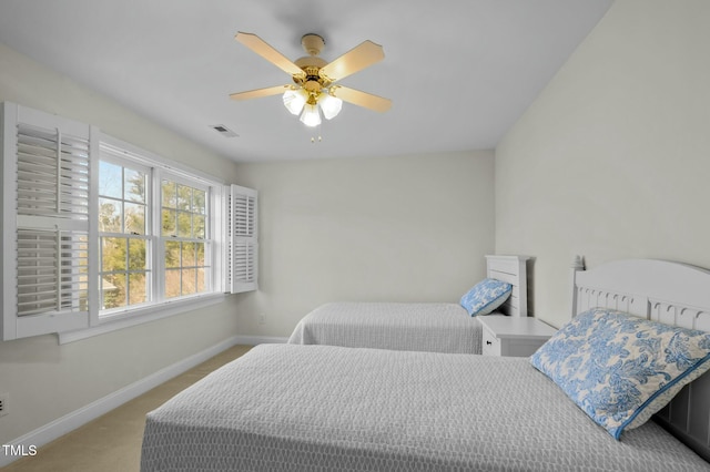 100 Maywood Way, Chapel Hill, NC 27516 - carpeted bedroom with baseboards and ceiling fan
