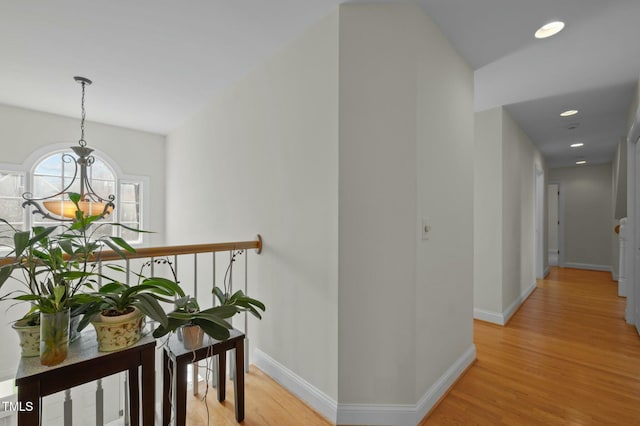 100 Maywood Way, Chapel Hill, NC 27516 - corridor featuring light wood finished floors, baseboards, recessed lighting, and a chandelier