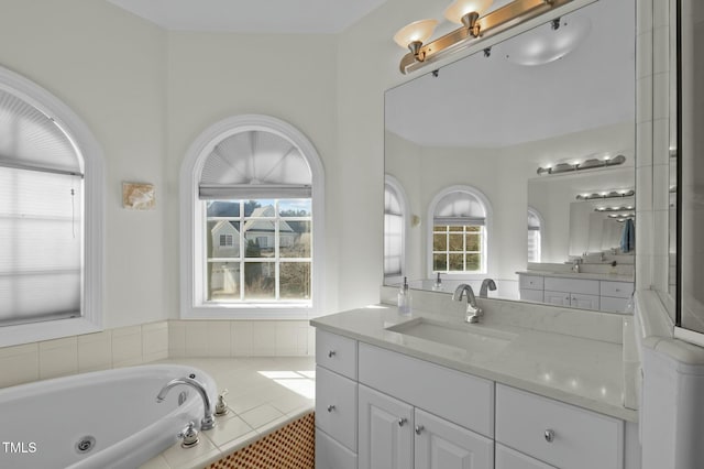 100 Maywood Way, Chapel Hill, NC 27516 - full bath with vanity, a tub with jets, and healthy amount of natural light