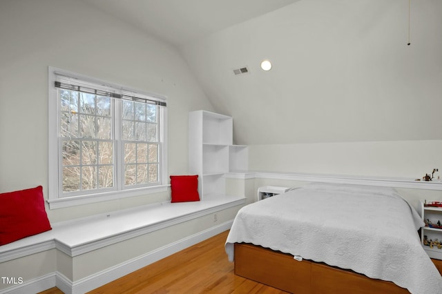 100 Maywood Way, Chapel Hill, NC 27516 - bedroom featuring wood finished floors, vaulted ceiling, and baseboards
