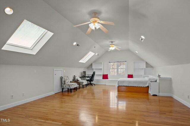 100 Maywood Way, Chapel Hill, NC 27516 - bonus room with a skylight, light wood finished floors, vaulted ceiling, a ceiling fan, and a desk