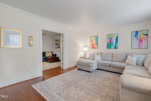 1115 Laurel Ln NW, Wilson, NC 27896 - living area featuring baseboards, ornamental molding, and wood finished floors