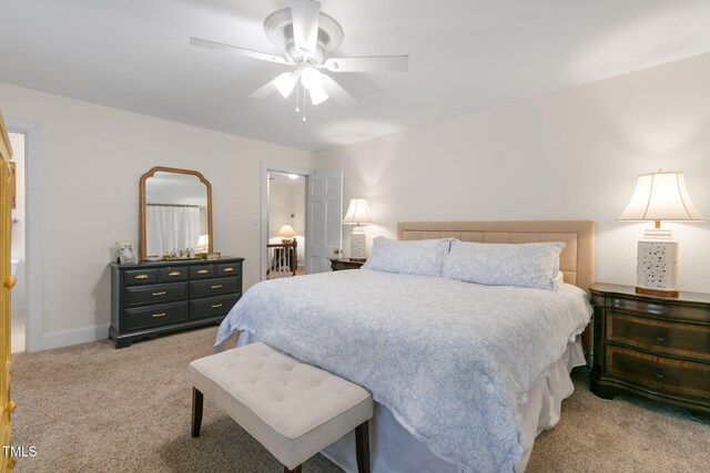 1115 Laurel Ln NW, Wilson, NC 27896 - bedroom with light colored carpet, a ceiling fan, and baseboards