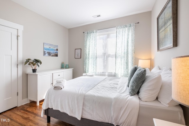 595 E Cabarrus St, Raleigh, NC 27601 - bedroom featuring wood finished floors