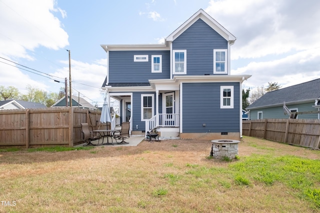 595 E Cabarrus St, Raleigh, NC 27601 - rear view of property with a fire pit and a patio