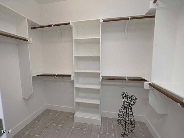595 E Cabarrus St, Raleigh, NC 27601 - walk in closet featuring wood tiled floors