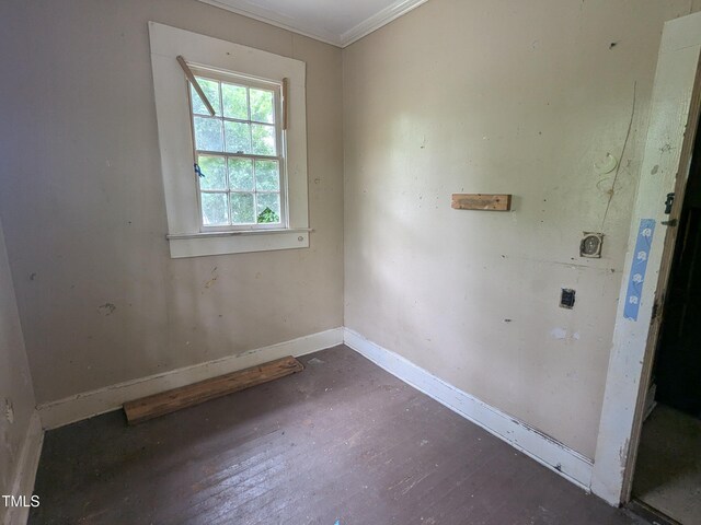 207 Bruton St W, Wilson, NC 27893 - empty room featuring ornamental molding, wood finished floors, and baseboards
